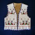 Professional restoration of Antique American Indian beadwork vests bags cradles shields