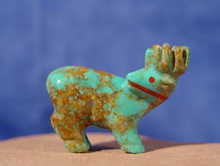 Zuni Indian Pueblo carving of elk in turquoise with coral heartline and eyes