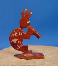 Zuni Pueblo Indian Kokopelli fetish figure carving in pipestone with etchings of cave art turquoise eyes